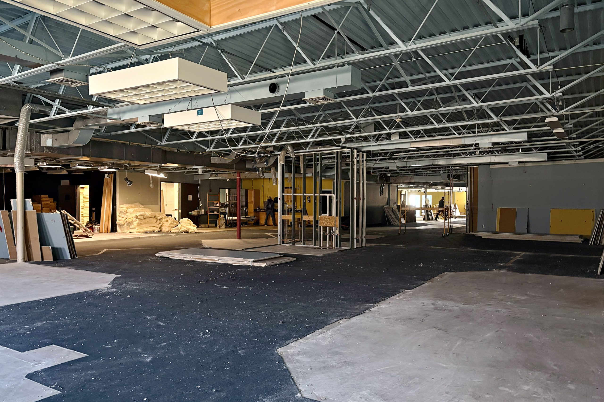 building renovations in progress with wall frames and flooring pulled up in the new building of Faith Lutheran Church of McLean County in Bloomington Illinois